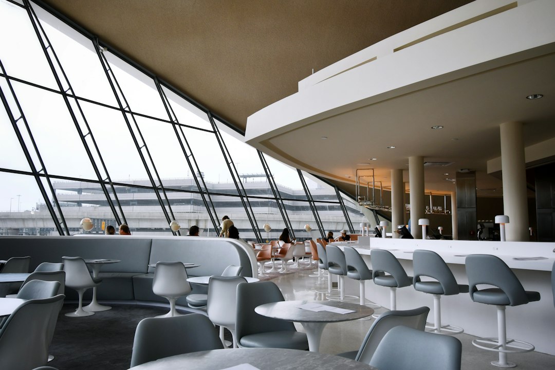 Interior of luxury airport lounge with comfortable first class travel seating