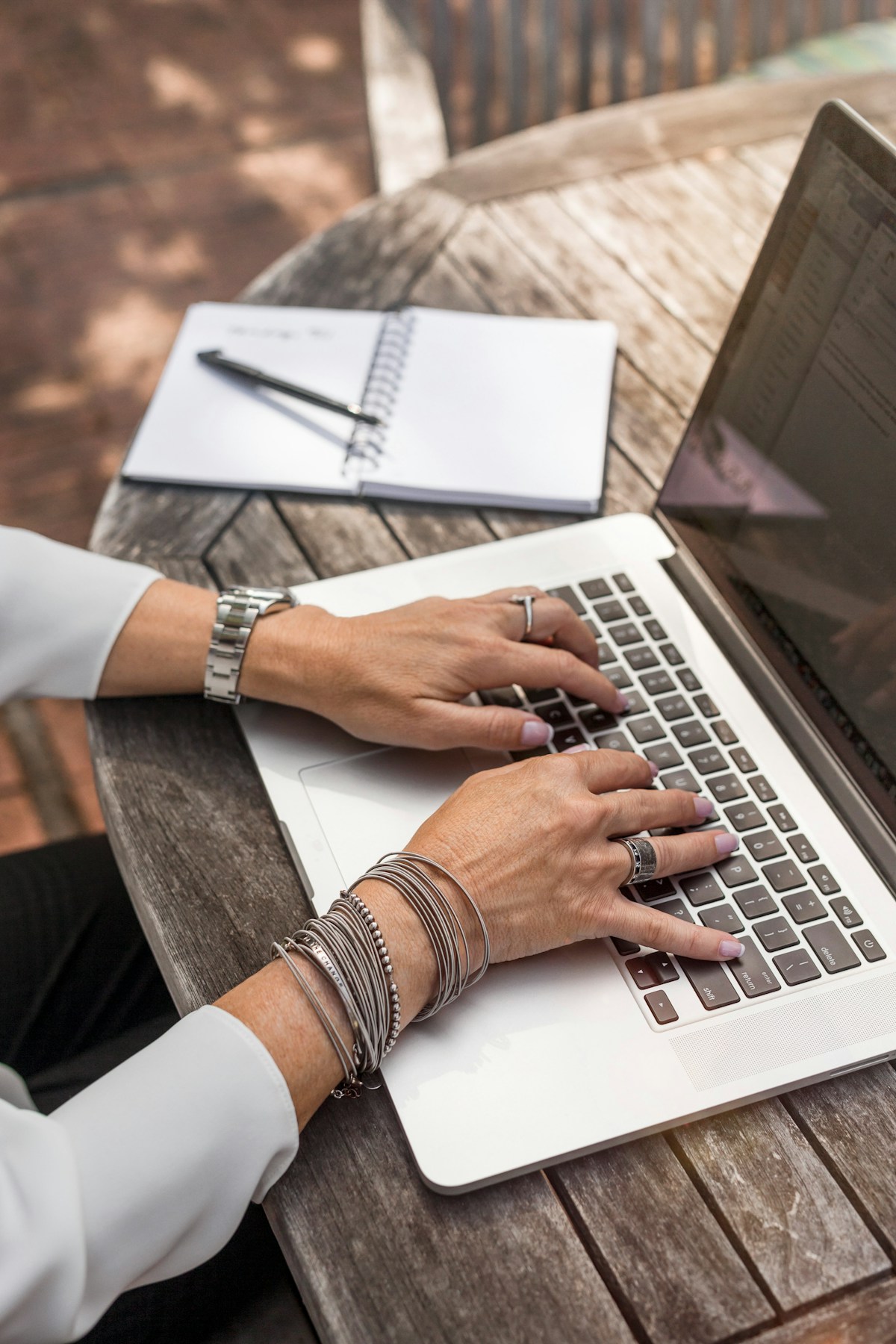 Luxury travel advisor reviewing automated client lifecycle email sequences and CRM integration dashboard