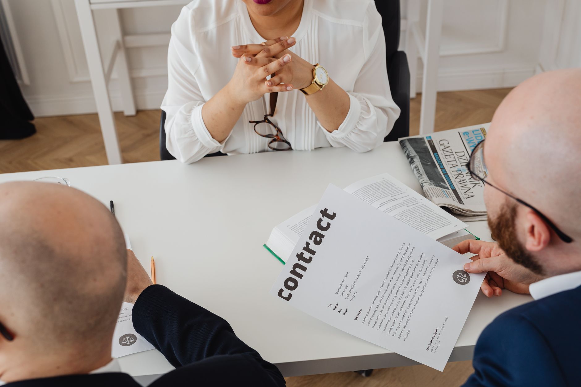 Travel advisor reviewing legal agreement, contract terms, and client ownership rights